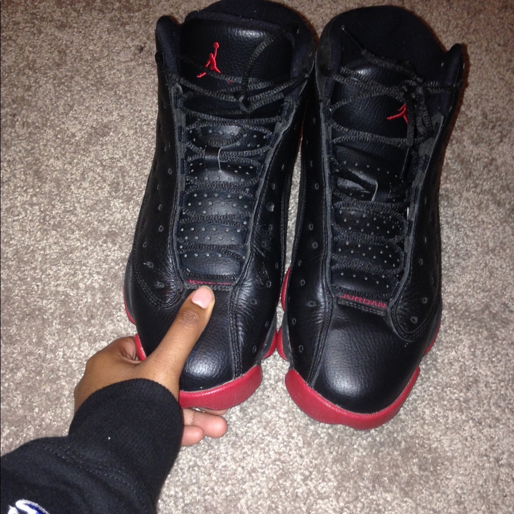 Red and black air jordan